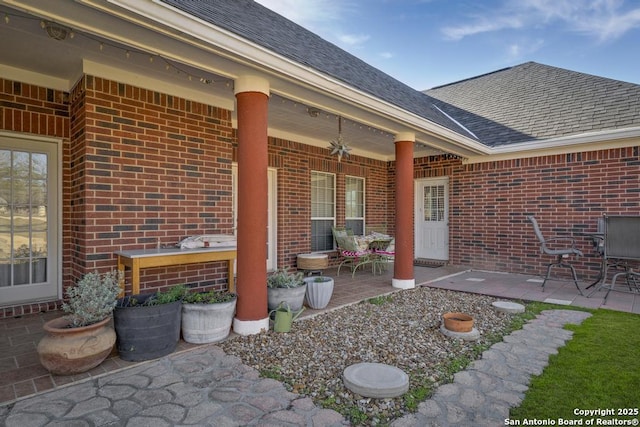 view of patio featuring ceiling fan