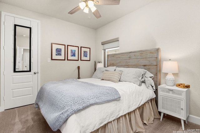 carpeted bedroom featuring ceiling fan