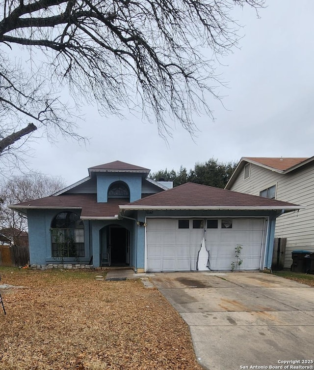 view of front of house with a garage