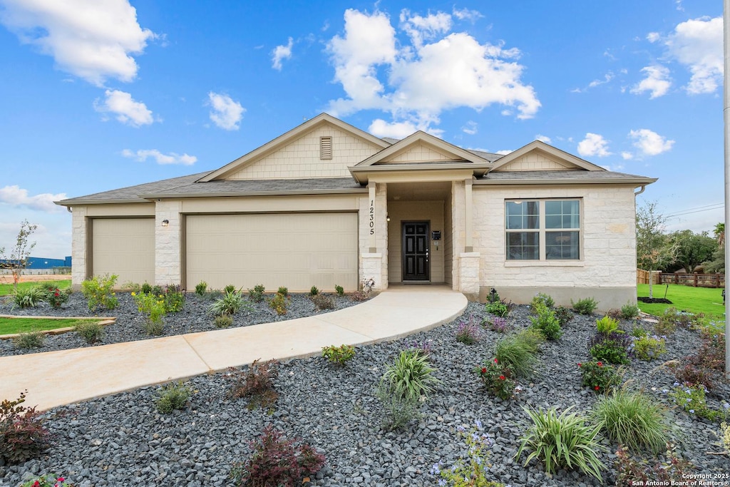 view of front of home with a garage