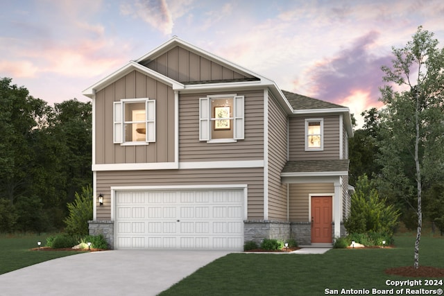 view of front of house featuring a garage, stone siding, a front lawn, and board and batten siding