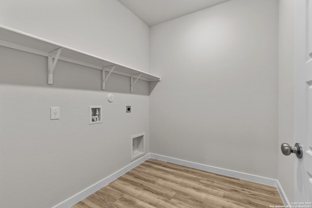 laundry room featuring laundry area, baseboards, hookup for a washing machine, light wood-type flooring, and electric dryer hookup