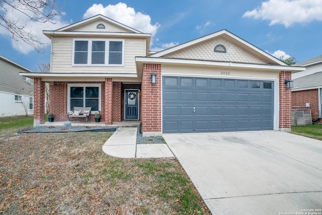 view of front of home featuring a garage and covered porch