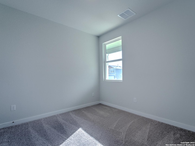 spare room with carpet flooring