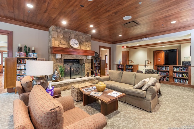 living room with crown molding, light colored carpet, and a fireplace