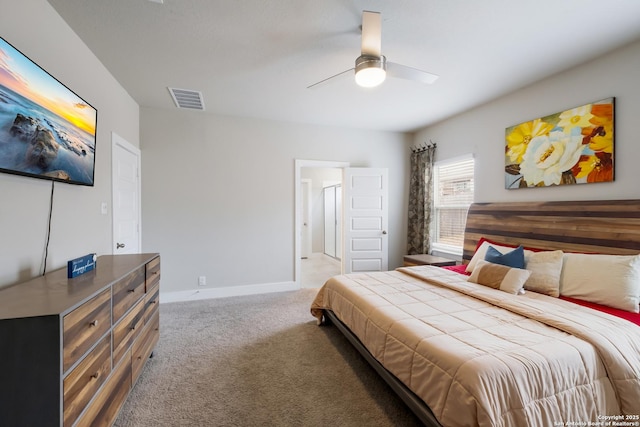 carpeted bedroom featuring ceiling fan