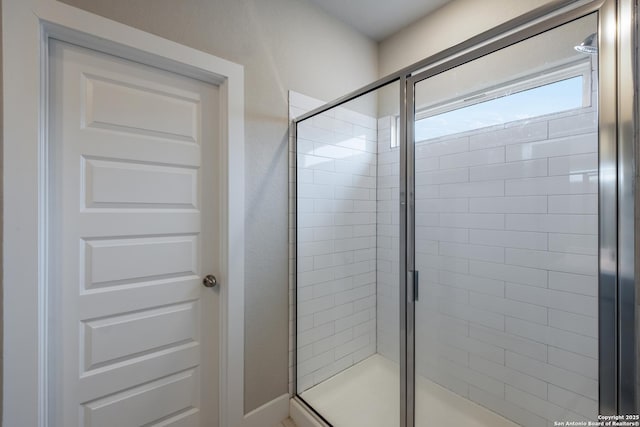 bathroom with an enclosed shower