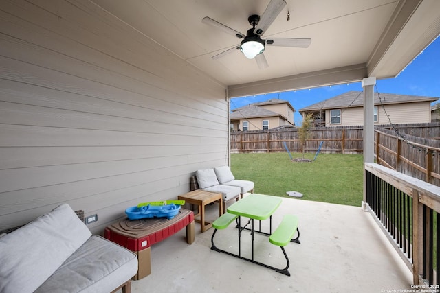 view of patio / terrace featuring an outdoor living space and ceiling fan