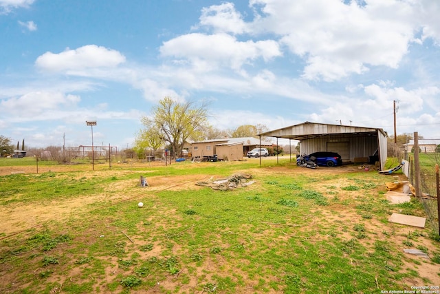 view of yard featuring a carport