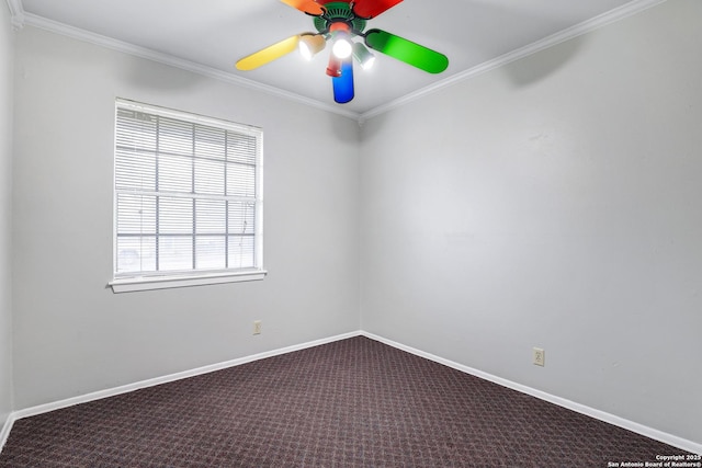 spare room featuring ornamental molding, carpet floors, and ceiling fan