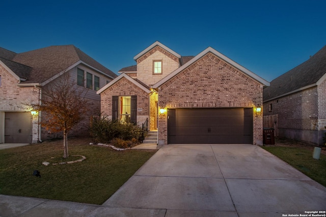 view of property with a garage and a front yard