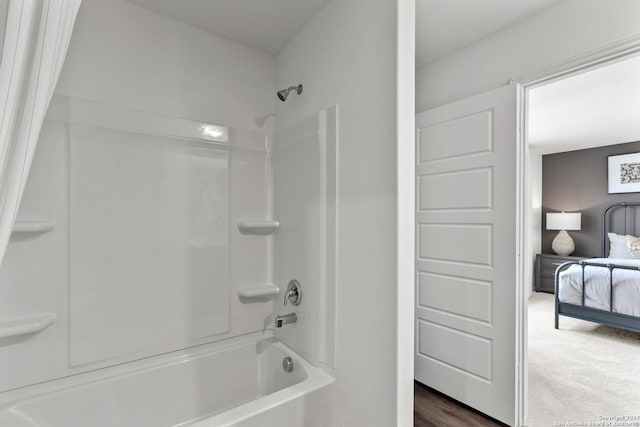 bathroom featuring shower / bathtub combination with curtain