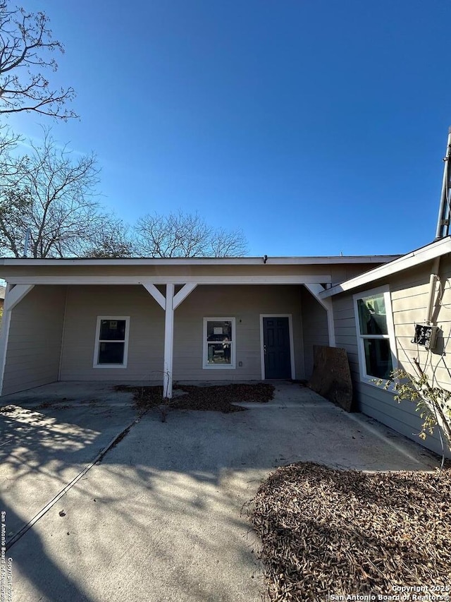 view of front of house with a patio area