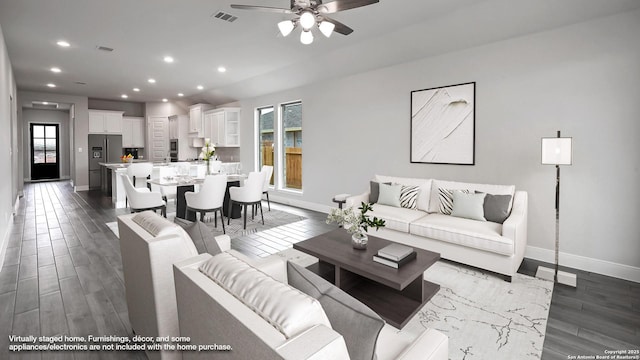 living area with baseboards, ceiling fan, recessed lighting, and visible vents