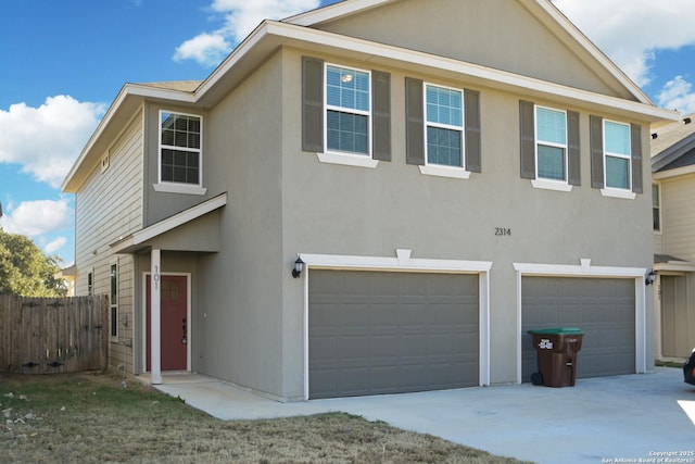 front of property with a garage