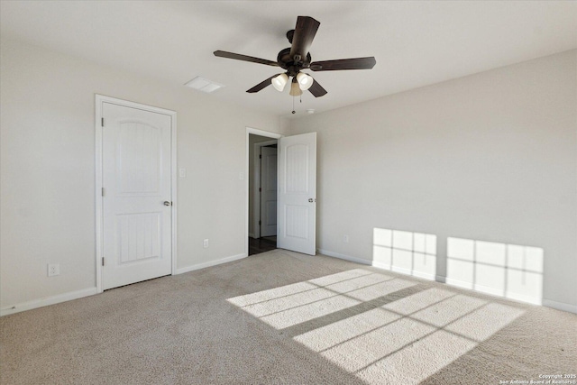 unfurnished bedroom with light carpet and ceiling fan