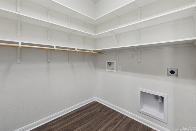 laundry area with washer hookup, hookup for a gas dryer, dark hardwood / wood-style floors, and hookup for an electric dryer