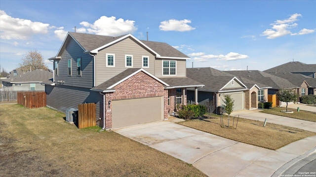 view of front of property with a garage and a front yard