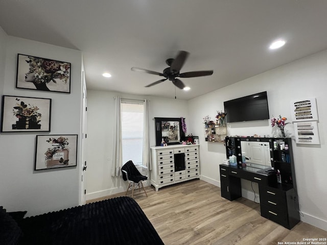 bedroom featuring ceiling fan and light hardwood / wood-style floors