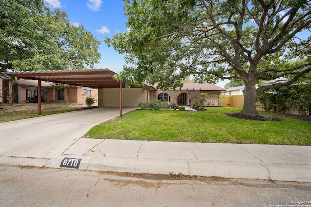 single story home with a carport and a front lawn