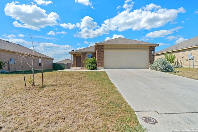 single story home with a garage and a front yard