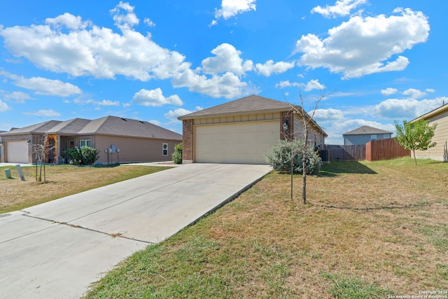 view of front of house featuring a garage and a front yard