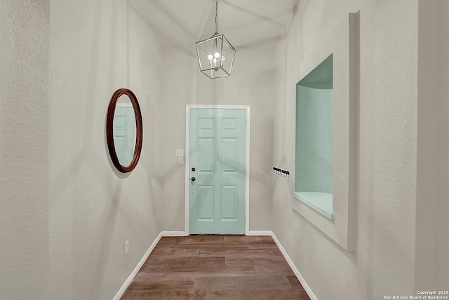 entryway with hardwood / wood-style floors