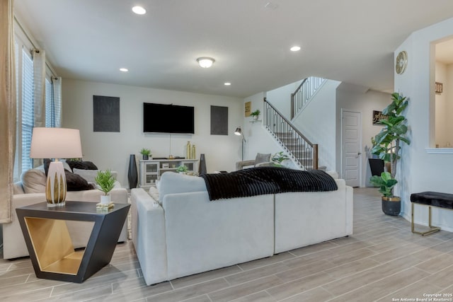 living room with light hardwood / wood-style floors