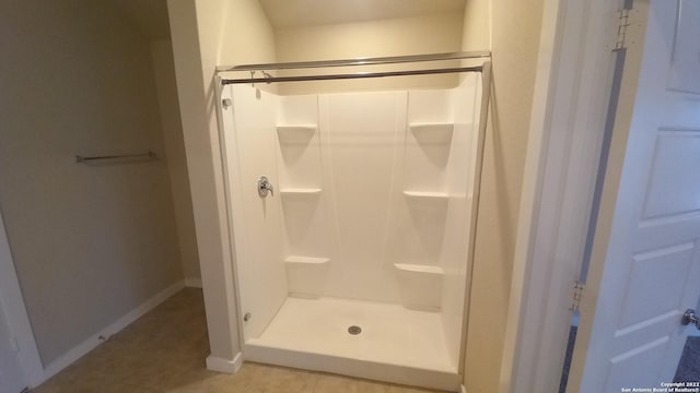 bathroom featuring walk in shower