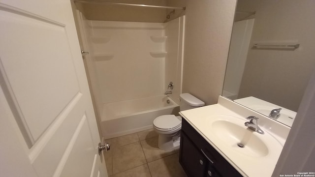 full bathroom featuring shower / bath combination, vanity, tile patterned floors, and toilet