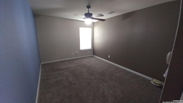 carpeted empty room with ceiling fan