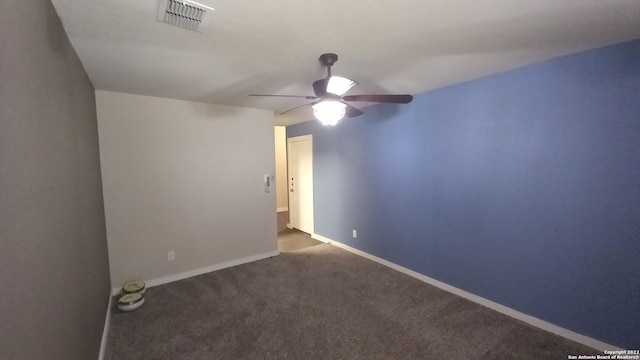 carpeted empty room with ceiling fan