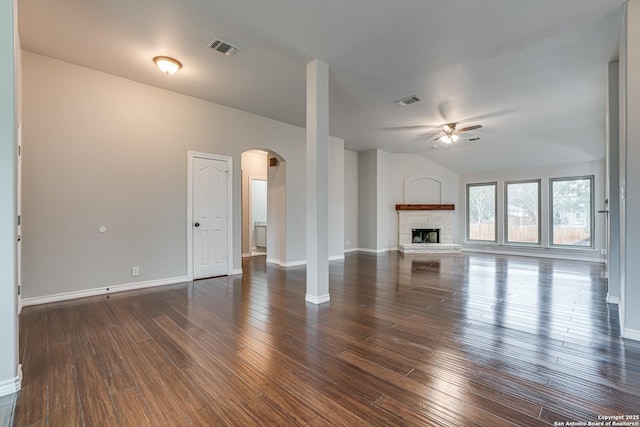 unfurnished living room featuring ceiling fan, lofted ceiling, and dark hardwood / wood-style floors