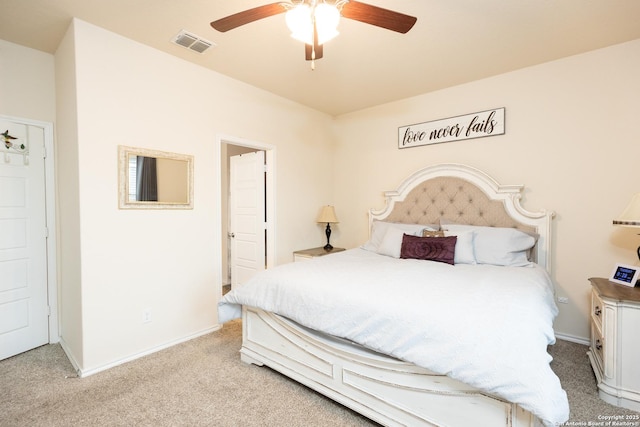 bedroom with light colored carpet and ceiling fan