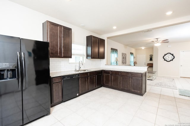 kitchen with black appliances, sink, backsplash, ceiling fan, and dark brown cabinetry