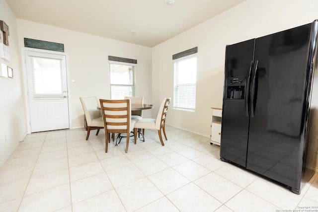 view of tiled dining space