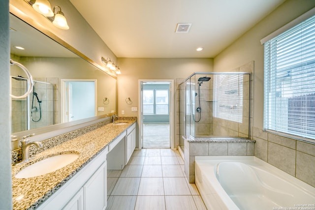 bathroom featuring vanity, separate shower and tub, and tile patterned flooring