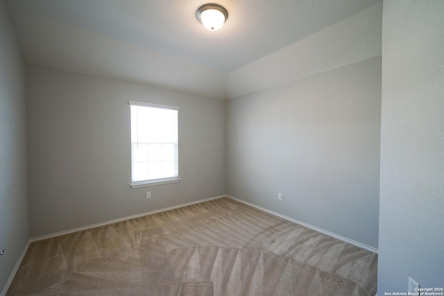 empty room featuring carpet flooring