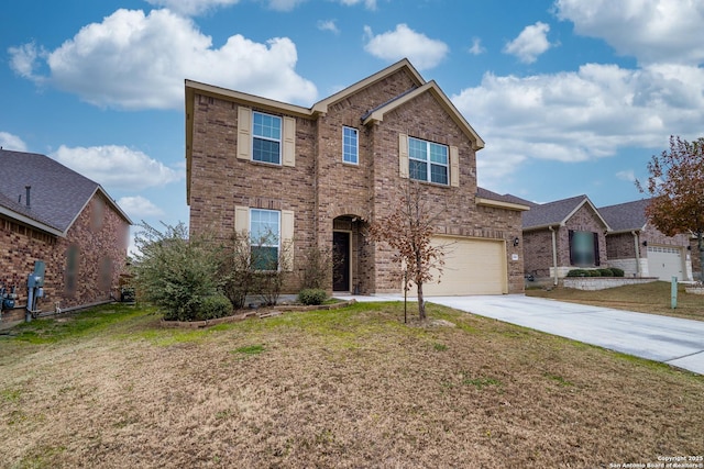 view of front of property featuring a garage and a front lawn