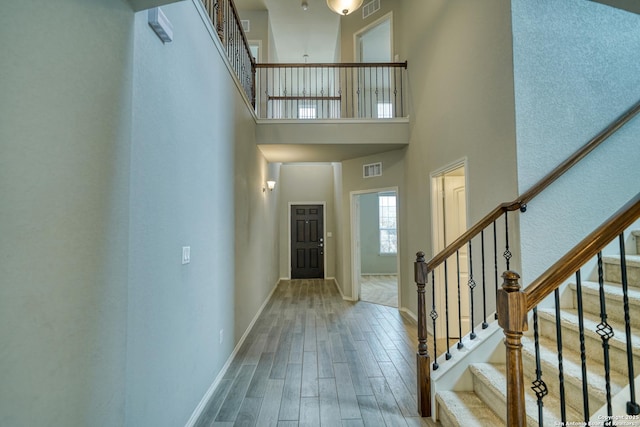 foyer entrance with a high ceiling