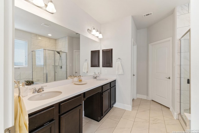 bathroom with vanity and walk in shower