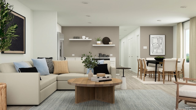 living room with light hardwood / wood-style floors