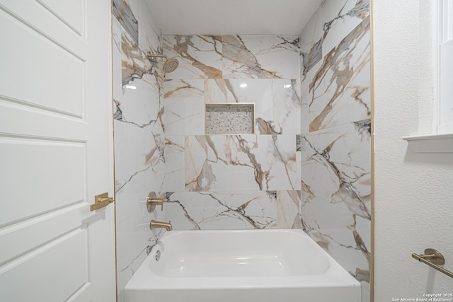 bathroom featuring bathing tub / shower combination