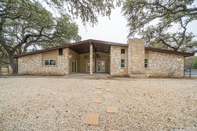 rear view of property with a patio area