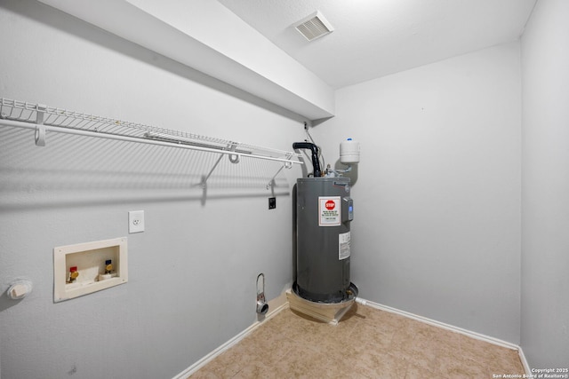 laundry room with water heater, electric dryer hookup, and hookup for a washing machine