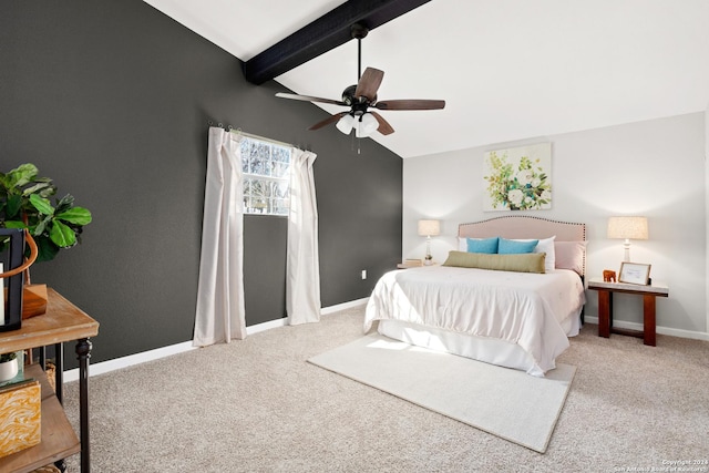 bedroom with vaulted ceiling with beams, ceiling fan, and carpet flooring