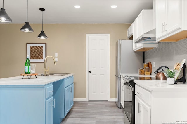 kitchen featuring blue cabinets, sink, stainless steel range with electric cooktop, decorative light fixtures, and white cabinets