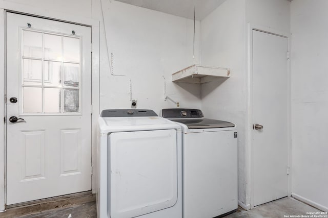 laundry room with independent washer and dryer