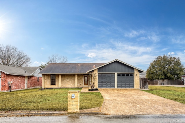 single story home with a garage and a front lawn