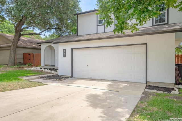 view of front of home with a garage